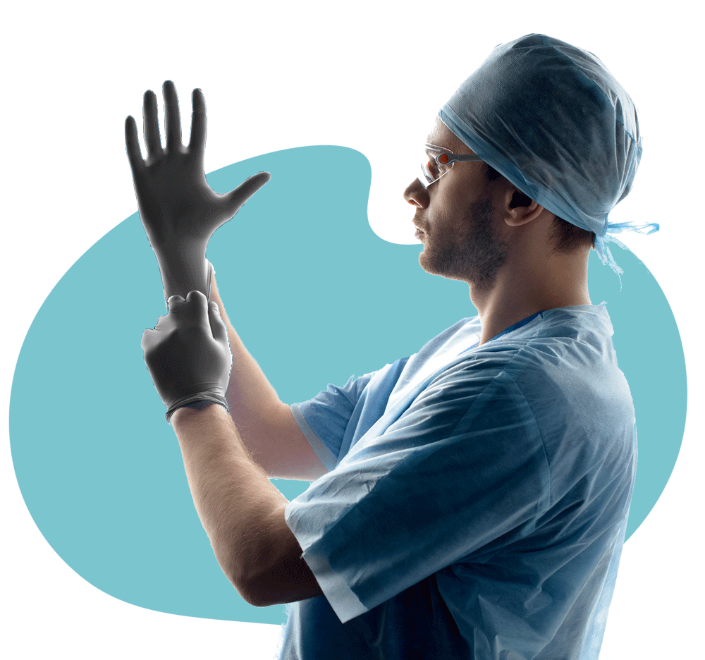 Healthcare worker donning glove